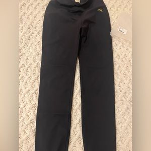 Tracksmith turn over tights excellent condition.